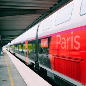 A sleek TGV train at a Paris railway station, showcasing modern design in public transportation.